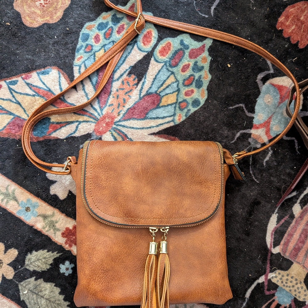 Classic Tan Crossbody Bag with Tassel Accent